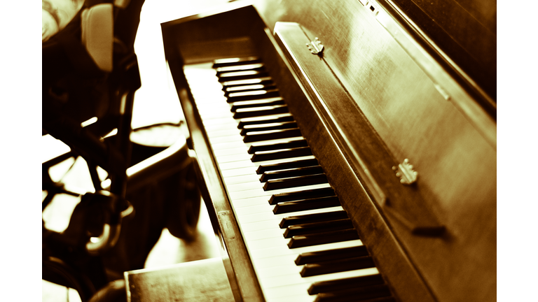 an ancient piano, an antique piece