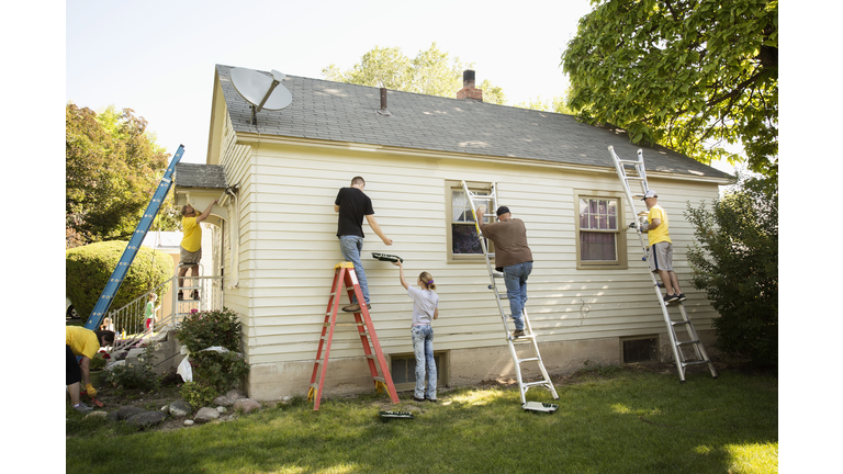 People painting house