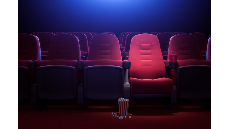 Row of empty red cinema seats