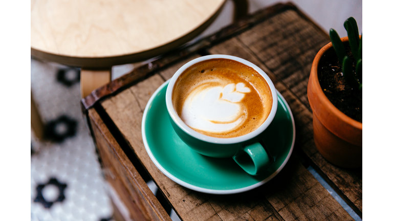 Cup of coffee on a wooden table