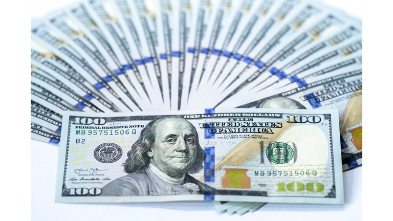 USD 100 dollars banknotes on a group of money isolated on white background