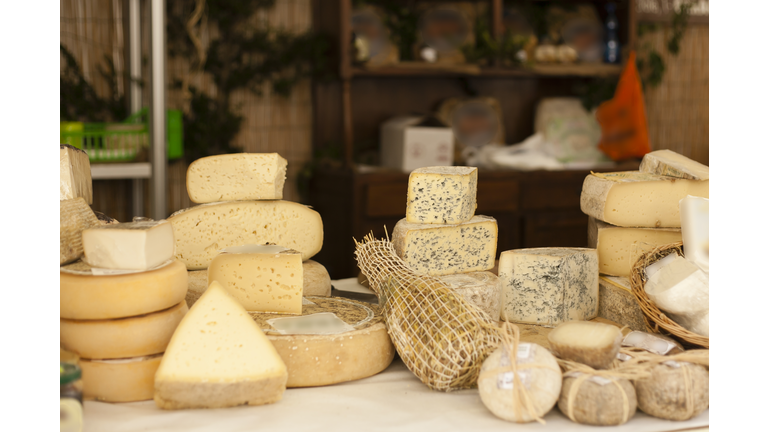 Cheese exposed on a market stall
