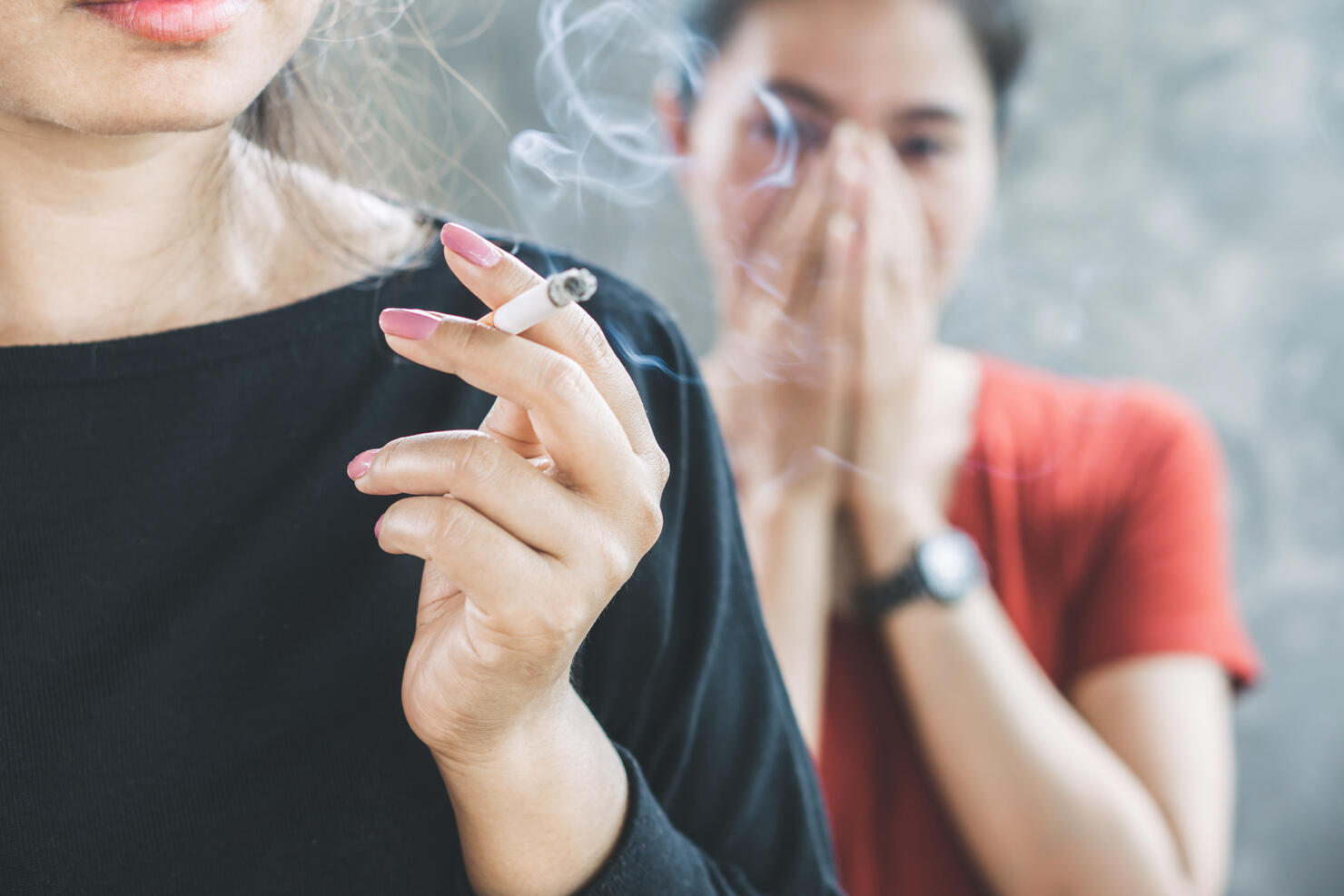 Woman Smoking Cigarette Indoors