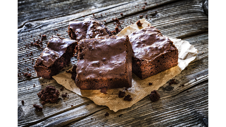 Chocolate brownies on rustic wooden table