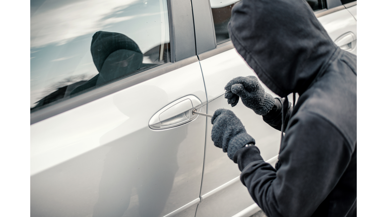 Man stealing a car