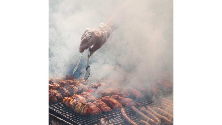 Smoke Emitting From Meat On Barbecue Grill