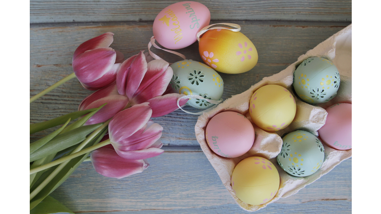 Easter Eggs And Pink Tulips. Flat Lay