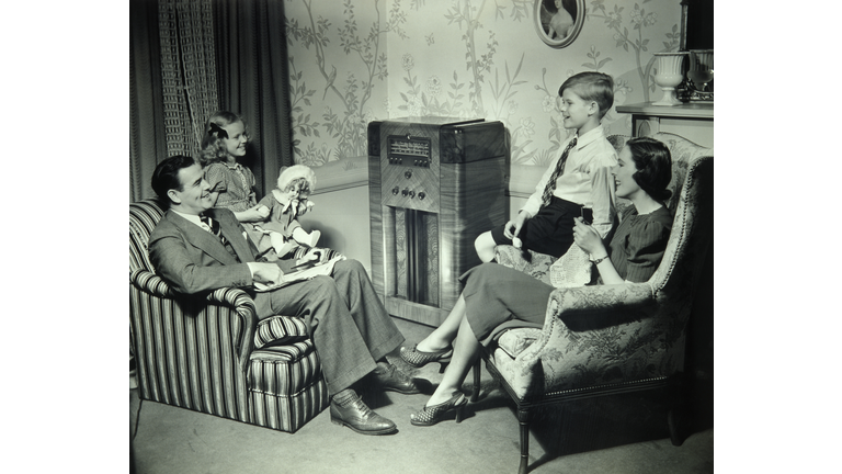 Family listening to radio