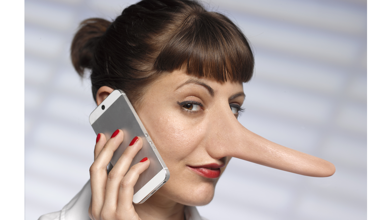 WOMAN TELLING LIES  ON MOBILE PHONE