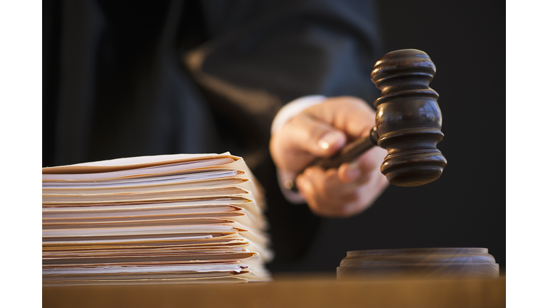 Judge holding gavel, close-up