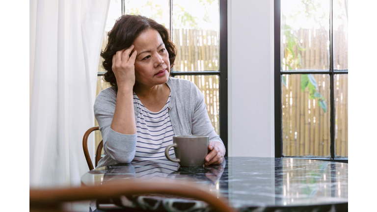 Emotionally stressed senior woman