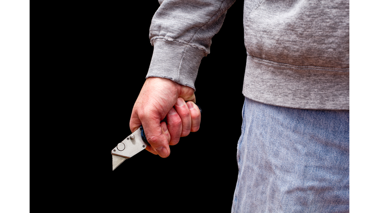 Man Brandishing Knife