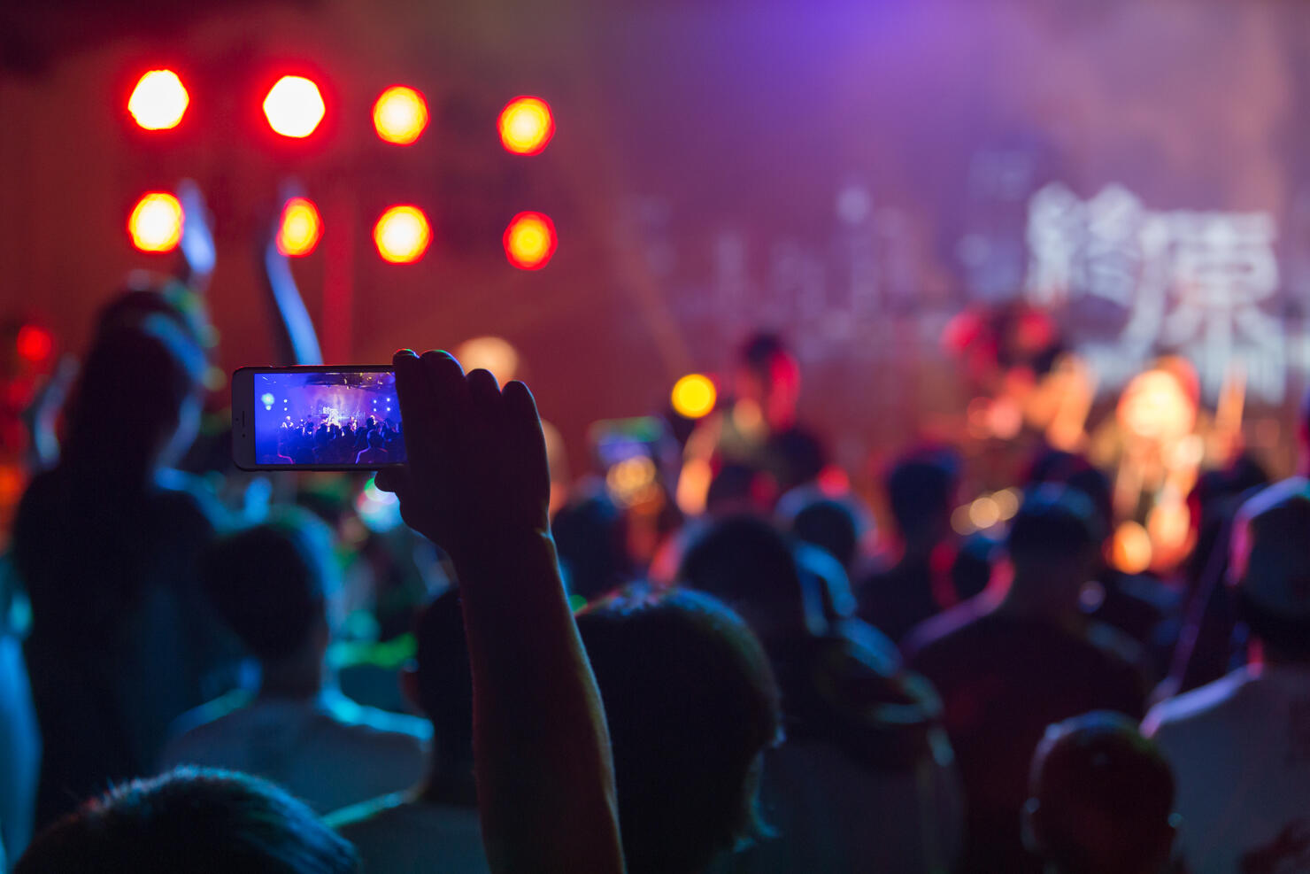 Crowd using smart phone at rock concert