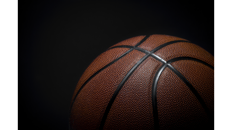 Closeup detail of basketball ball texture background