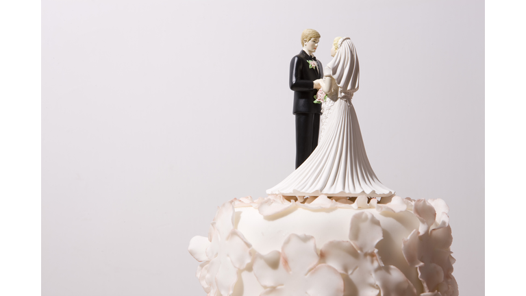Wedding cake and bride and groom cake topper