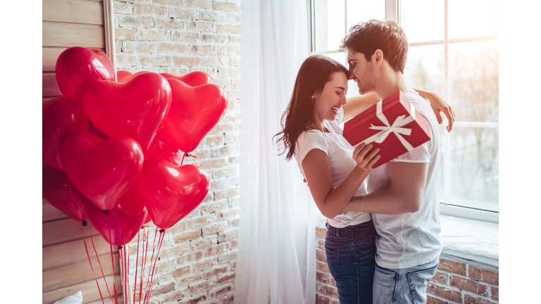 Couple in bedroom.