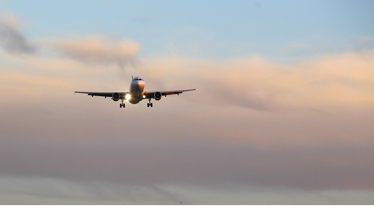 An airplane approaches an airport in San Diego, California.
