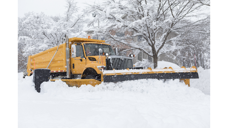 Snow Plow Plowing Street After Snow Storm
