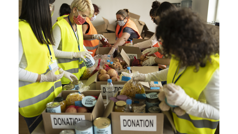 Collecting food for donation in a homeless shelter