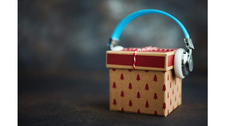 Christmas Gift with Headphones. Gift of Music