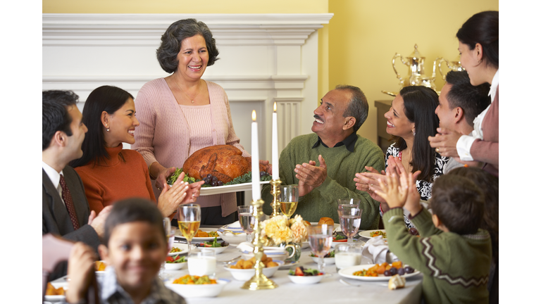 Family at thanksgiving dinner table