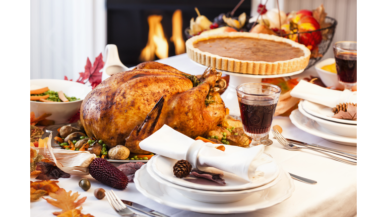 Thanksgiving Dinner with Stuffed Turkey and Side Dishes