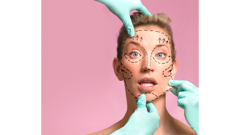 Plastic surgeon marking up for surgery