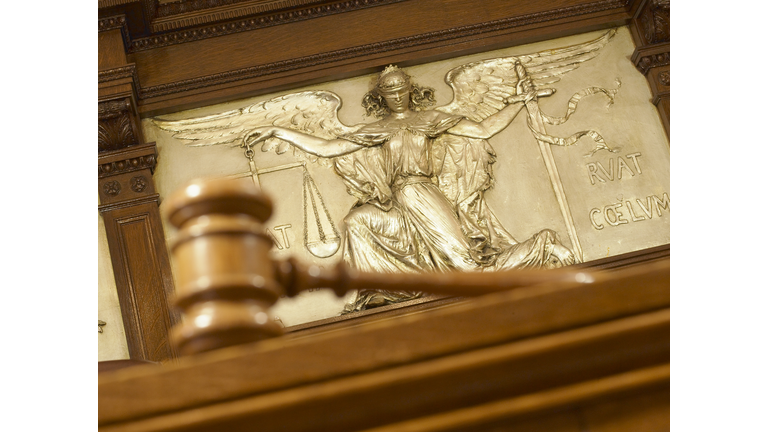 Gavel and Figure of Justice