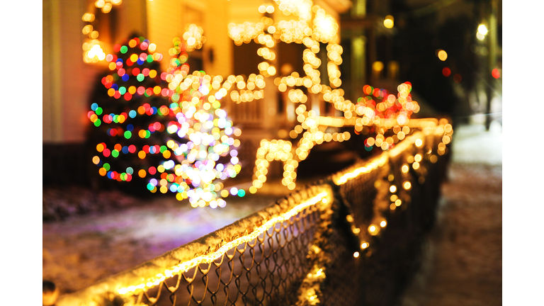 shiny Christmas decorations outside at night