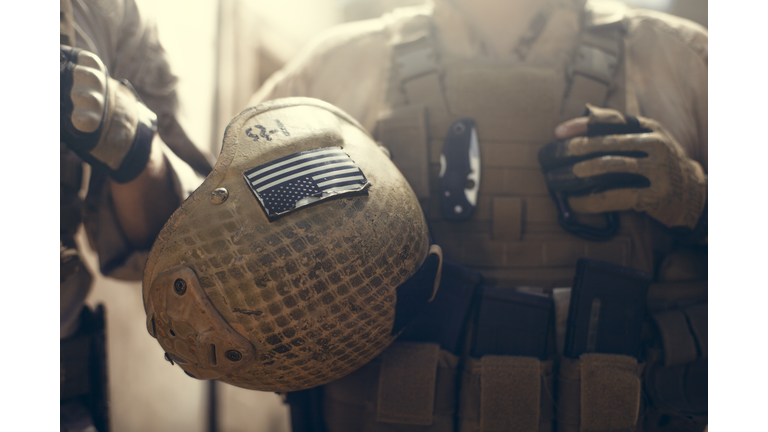 American flag on helmet of US Marine soldier.