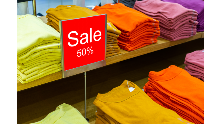 Sale mock up advertise display frame in the shopping department store. Shopping sale sign 50% sale at adepartment. Shopping concept, Advertisement concept