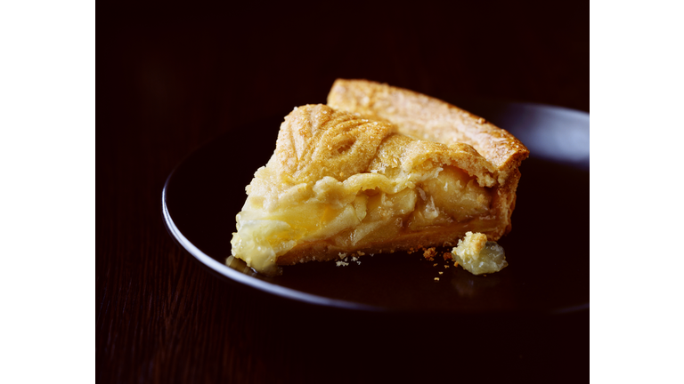 Slice of apple pie on plate