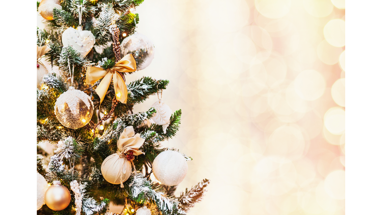 Decorated Christmas tree on holiday background