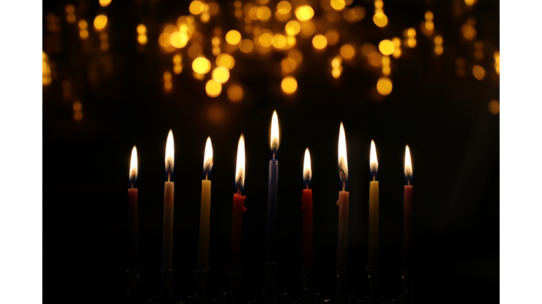 Religion image of jewish holiday Hanukkah background with menorah (traditional candelabra) and candles