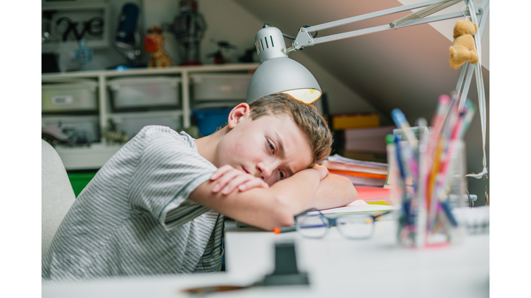stressed student during home schooling pandemic alert