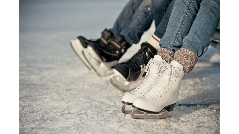 Girl skating on an outdoor skating rink