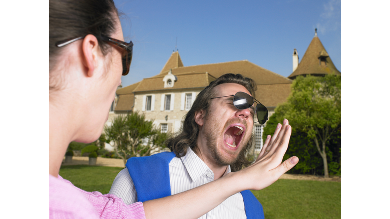 Woman slapping man