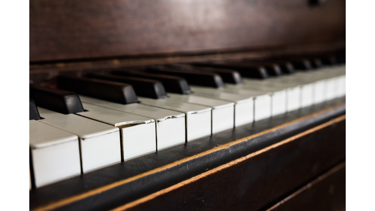 Vintage brown wood upright piano keys