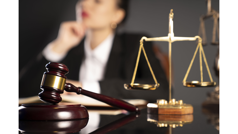 Female advocate in lawyer’s office.