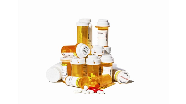 Pile of Prescription Pills and Bottles
