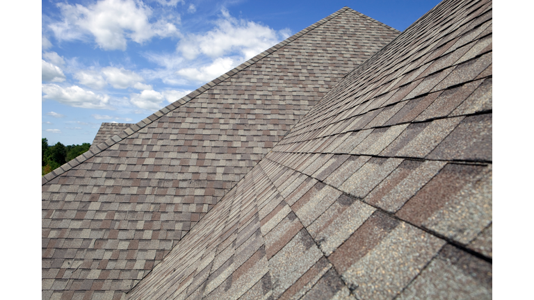 New Shingled Roof with Blue Sky Background