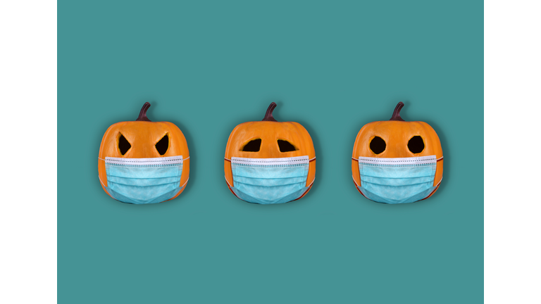Halloween pumpkins with surgical mask