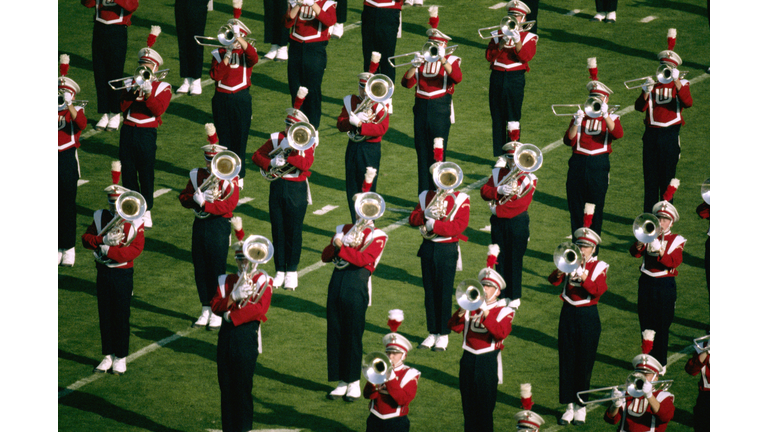 Marching band playing on field