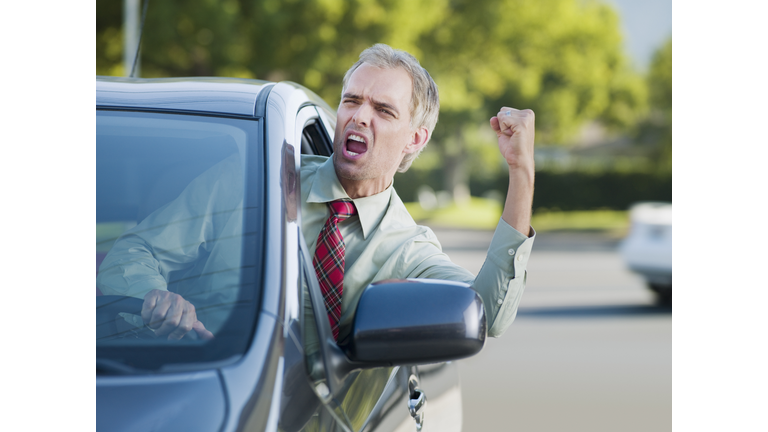 Angry driver shouting out car window