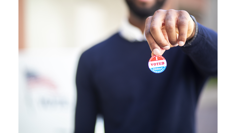 Young Black Man with I voted Sticker