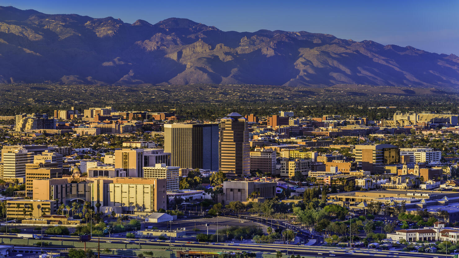 Tucson Arizona skyline cityscape and Santa Catalina Mountains at sunset