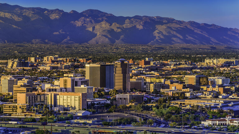 Tucson Arizona skyline cityscape and Santa Catalina Mountains at sunset
