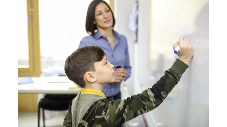 Teacher with a student on board