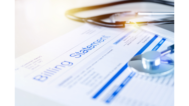 Health care billing statement with stethoscope