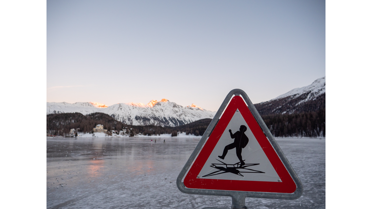 Warning sign on Frozen lake